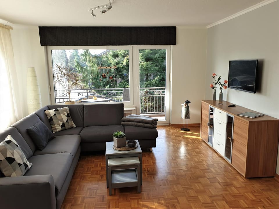Bed, Balcony/Terrace, Living room, Seating area, Garden view