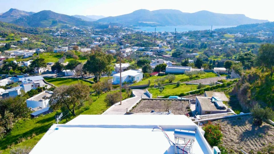Property building, Nearby landmark, Natural landscape, Bird's eye view, City view, Mountain view, Street view