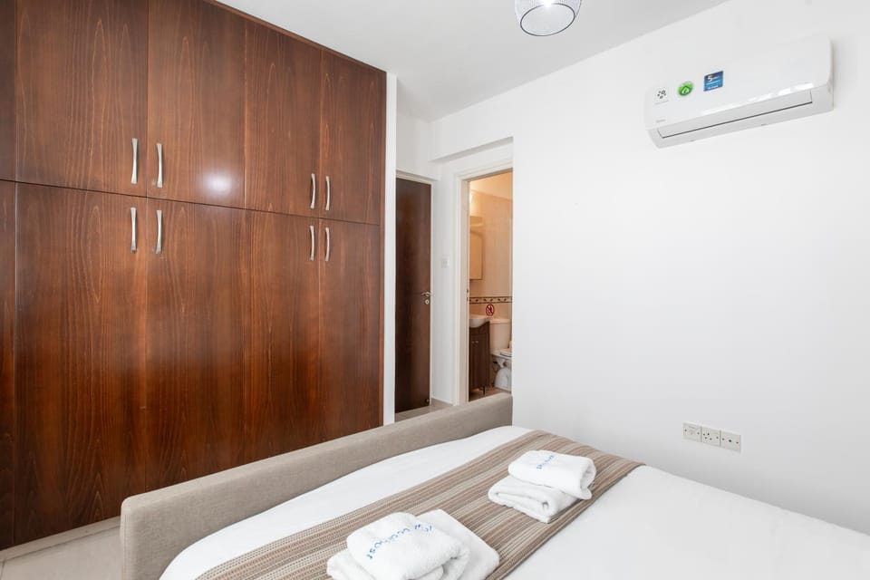 Bed, Bedroom, towels, wardrobe, air conditioner