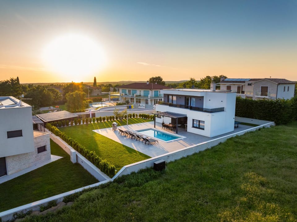 Property building, Natural landscape, Garden, Pool view, Swimming pool, Sunset, sunbed
