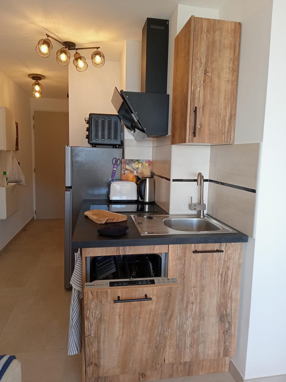Kitchen or kitchenette, oven, stove, toaster