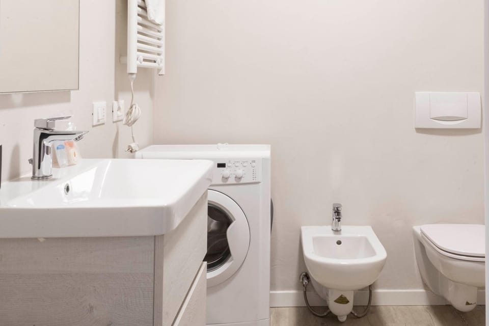 Bathroom, bidet, washing machine