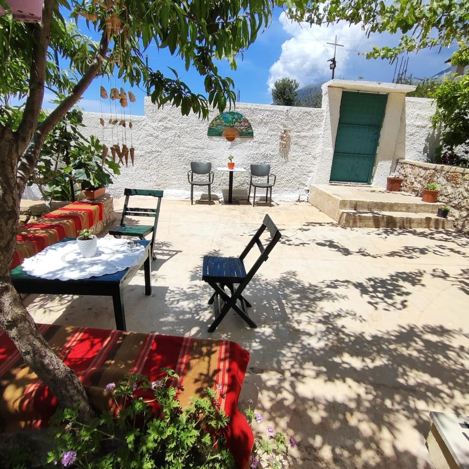 Property building, Patio, Spring, Natural landscape, Garden, View (from property/room), Seating area, Garden view