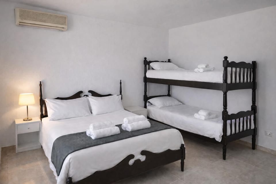 Bed, Photo of the whole room, Bedroom, towels, air conditioner