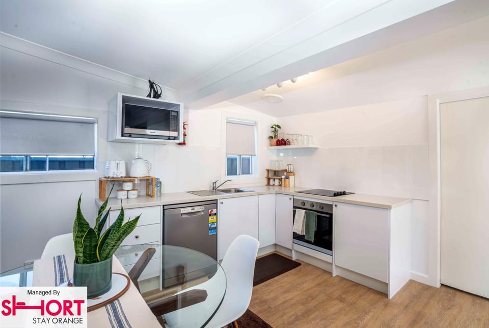 Kitchen or kitchenette, Dining area, dishwasher, oven, stove, toaster