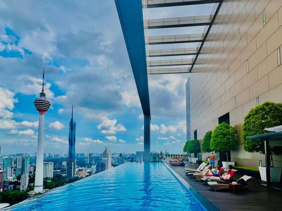 Property building, Day, People, Neighbourhood, Natural landscape, City view, Pool view, Swimming pool, group of guests
