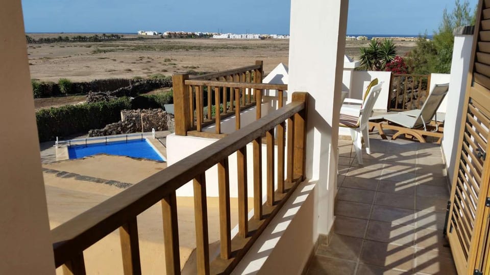 View (from property/room), Balcony/Terrace, Pool view, Sea view, Swimming pool