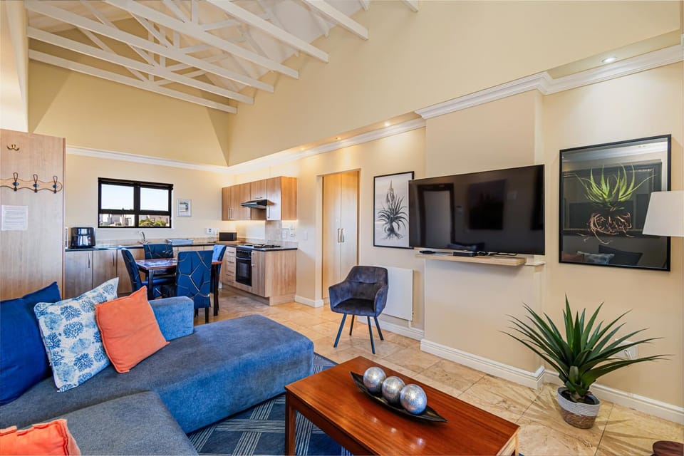 TV and multimedia, Living room, Seating area, microwave, oven, stove, toaster, kitchen