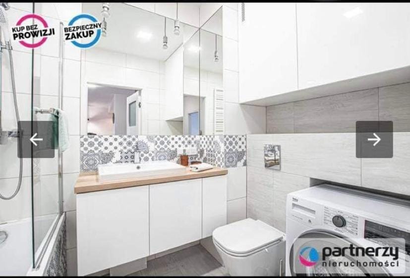 Toilet, Bathroom, towels, washing machine, dryer