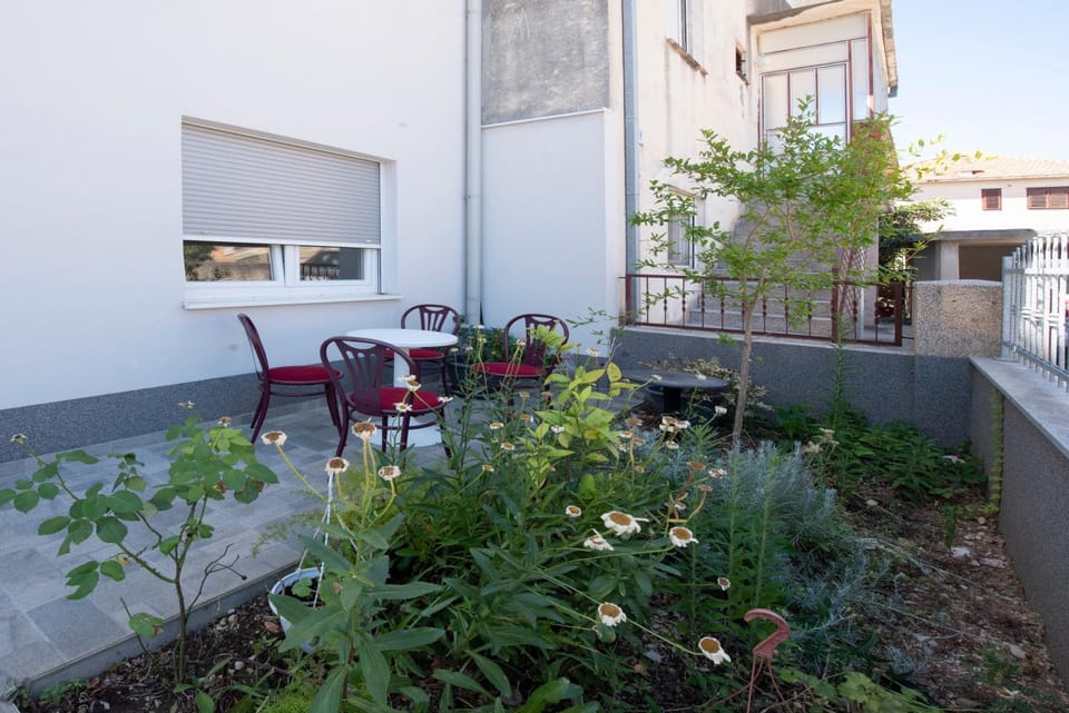 Sunny attic apartment with balcony & Modern city apartment with outdoor area, no balcony Apartment in Trogir
