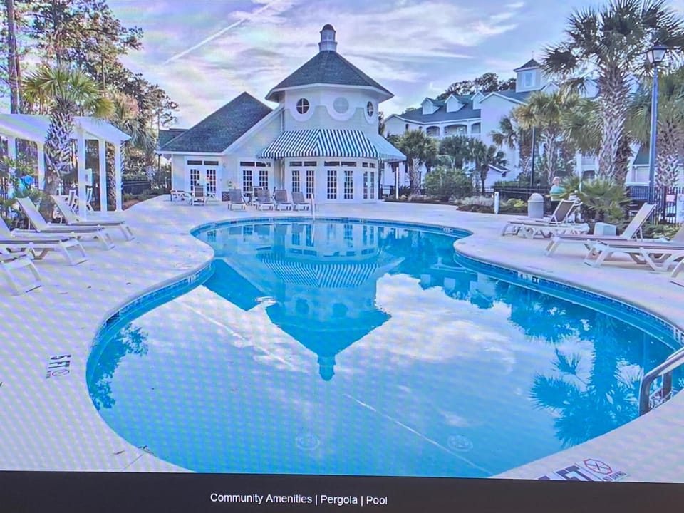 First Class Treatment Luxurious end unit Patio Pool Restaurant Bar on premises Steps away from Everything else! Spacious Condo Stocked with all You Need! Apartment hotel in Carolina Forest