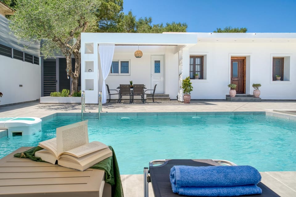 Property building, Patio, Living room, Seating area, Pool view, Swimming pool, sunbed