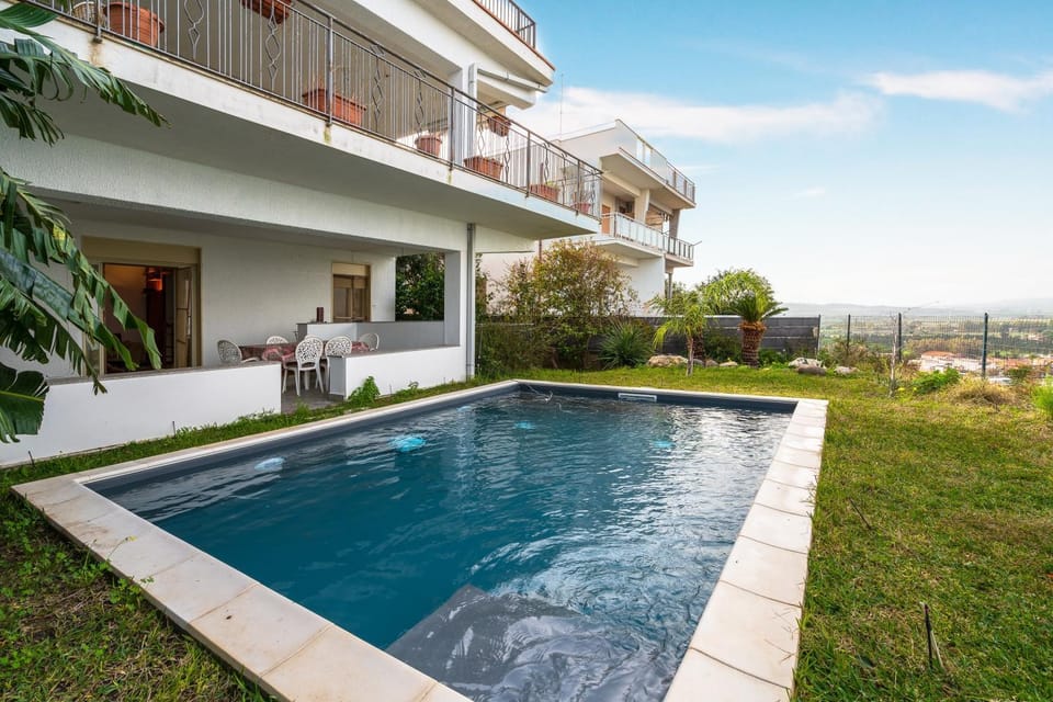 Property building, Living room, Swimming pool