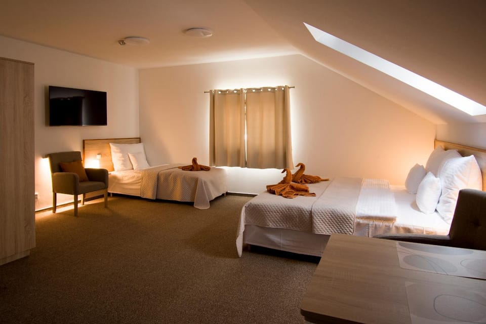 Bed, Living room, Seating area, Bedroom