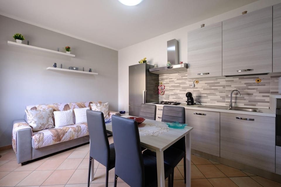 Kitchen or kitchenette, Living room, Seating area, Dining area, stove
