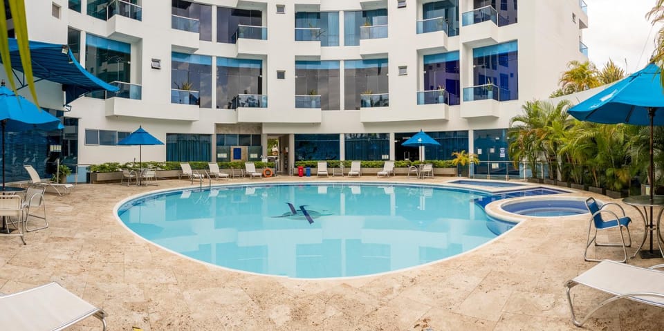 Property building, Day, Pool view, Swimming pool, sunbed