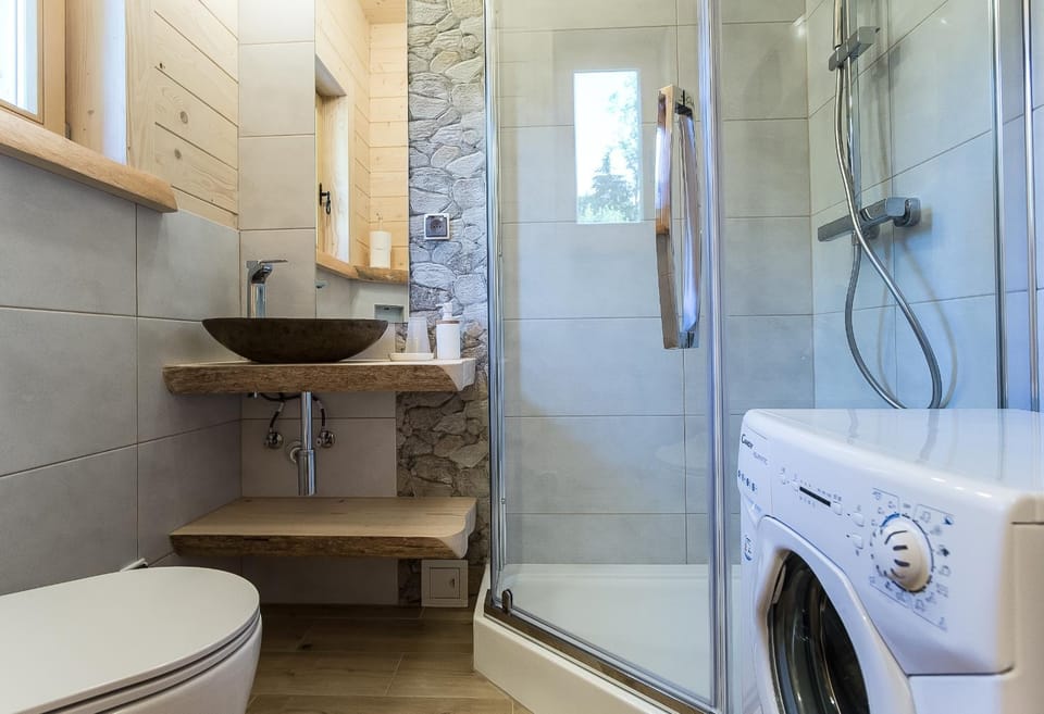 Shower, Toilet, Bathroom, towels, washing machine, dryer