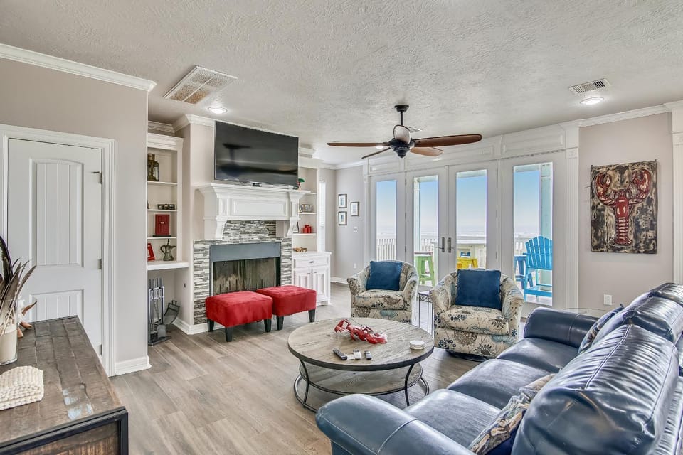 TV and multimedia, Living room, Seating area, Beach, Sea view, fireplace, furniture