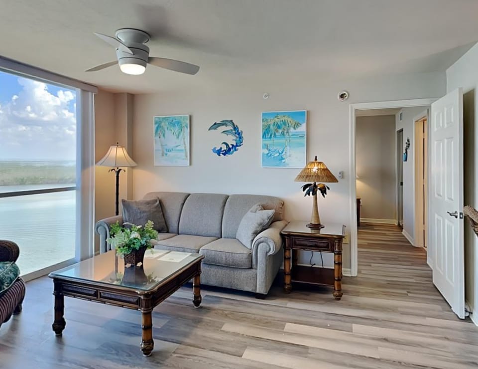View (from property/room), Living room, Seating area, Sea view, furniture