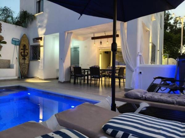Villa Alhamar con piscina climatizada privada Villa in Punta Umbría