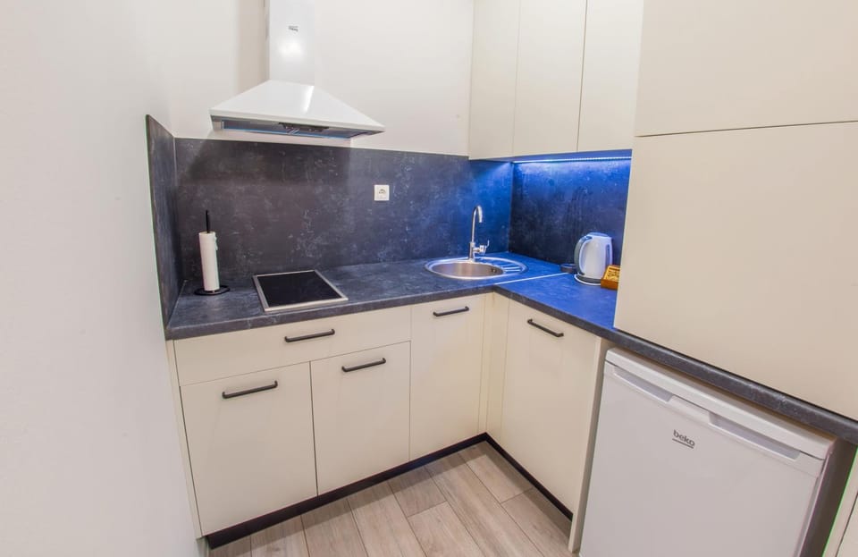 Kitchen or kitchenette, stove