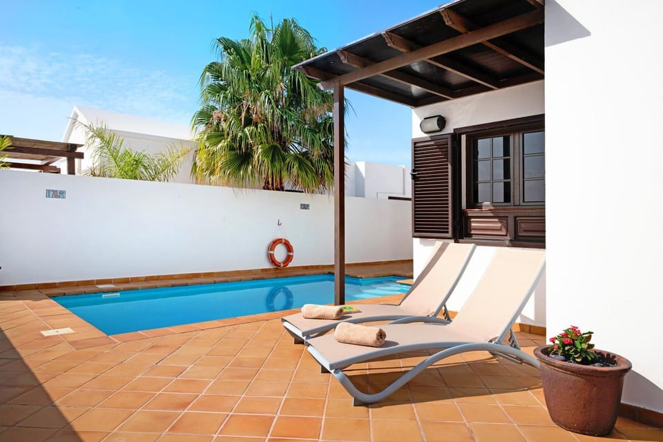 Property building, Living room, Swimming pool