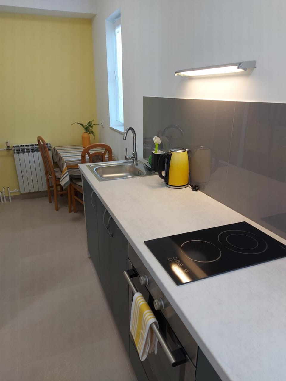 Kitchen or kitchenette, stove