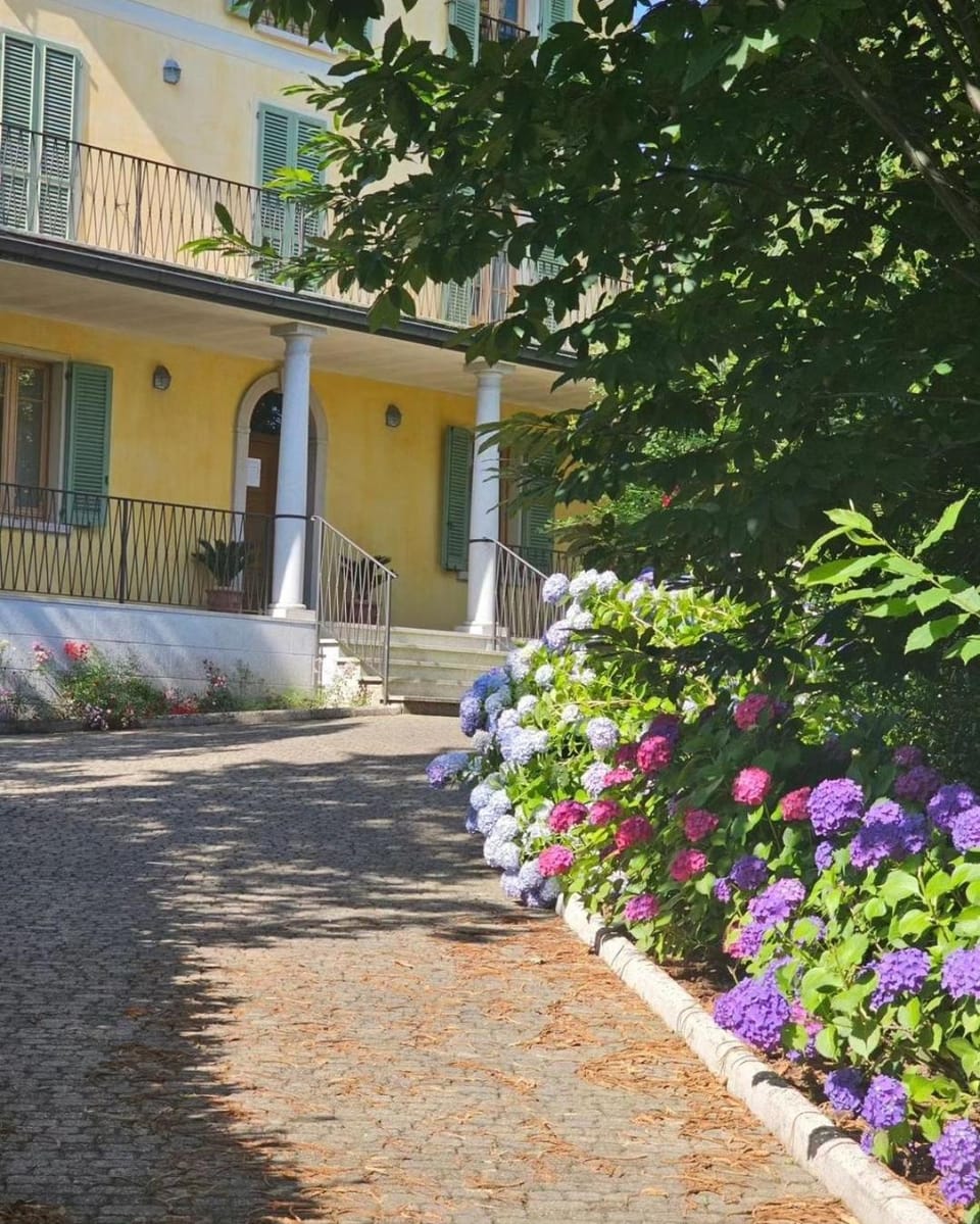 The Ortensia, our Room with Lake View, Spacious Park-Facing Balcony and Private External Bathroom at the Villa Isabella Stresa Bed and Breakfast in Stresa