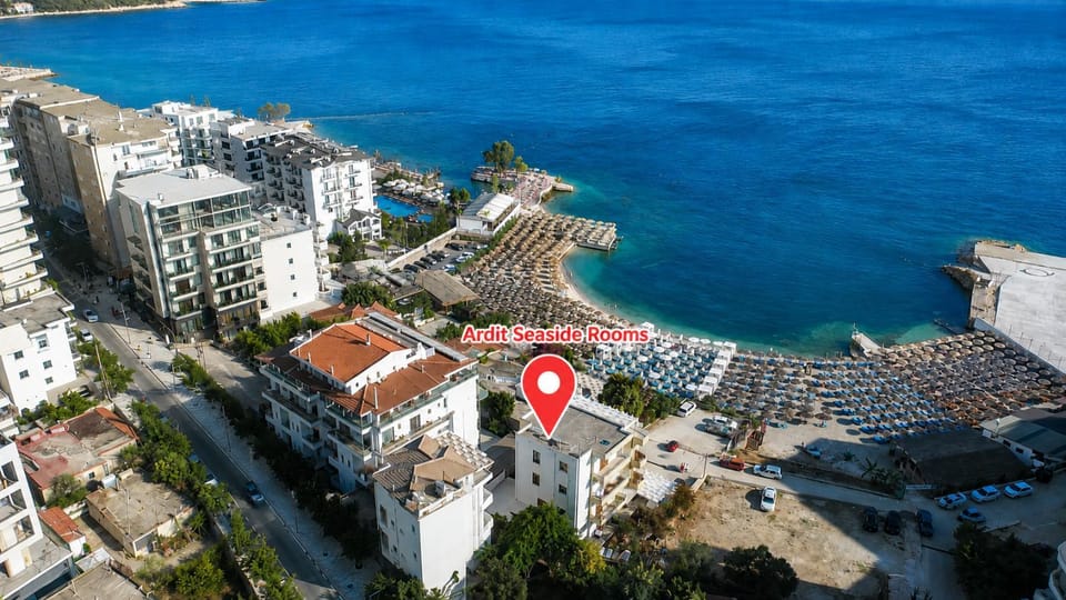 Property building, Nearby landmark, Day, Natural landscape, Beach, City view, Sea view