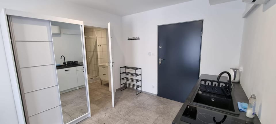 Kitchen or kitchenette, stove, wardrobe