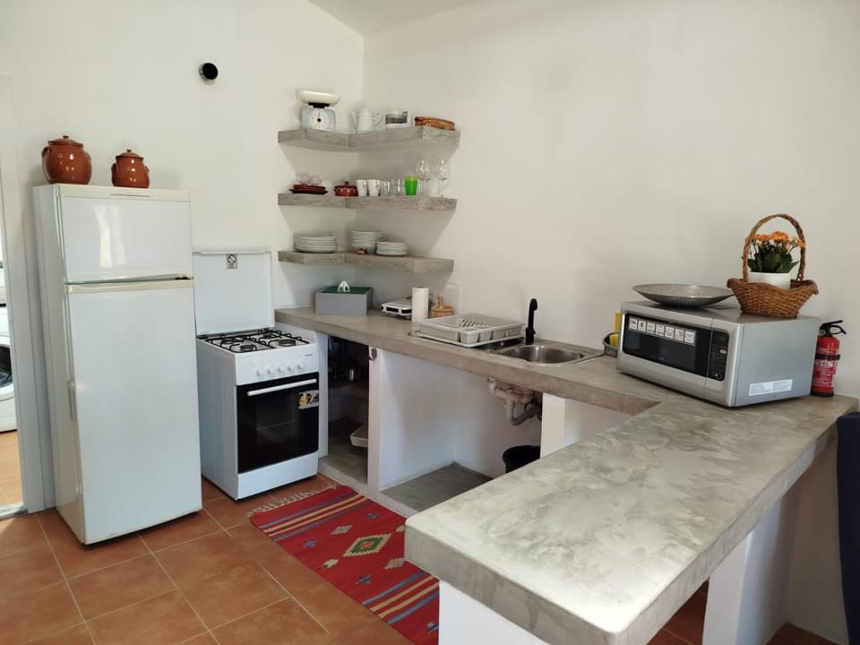 Kitchen or kitchenette, oven, toaster