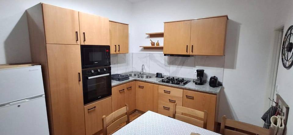 Kitchen or kitchenette, oven, stove