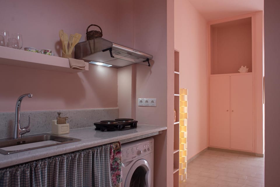 Kitchen or kitchenette, stove, washing machine