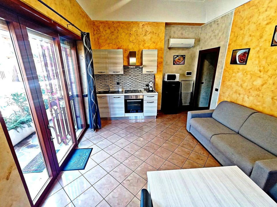 Kitchen or kitchenette, Living room, Seating area, Dining area, oven, stove, air conditioner