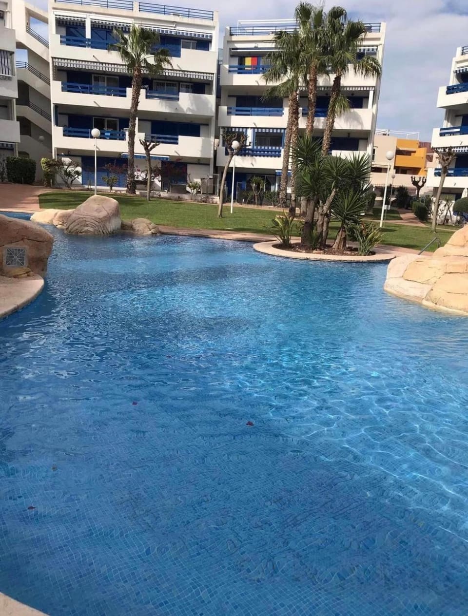 Property building, Day, Pool view, Swimming pool, sunbed