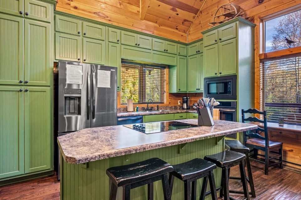 Kitchen or kitchenette, dishwasher, oven, stove