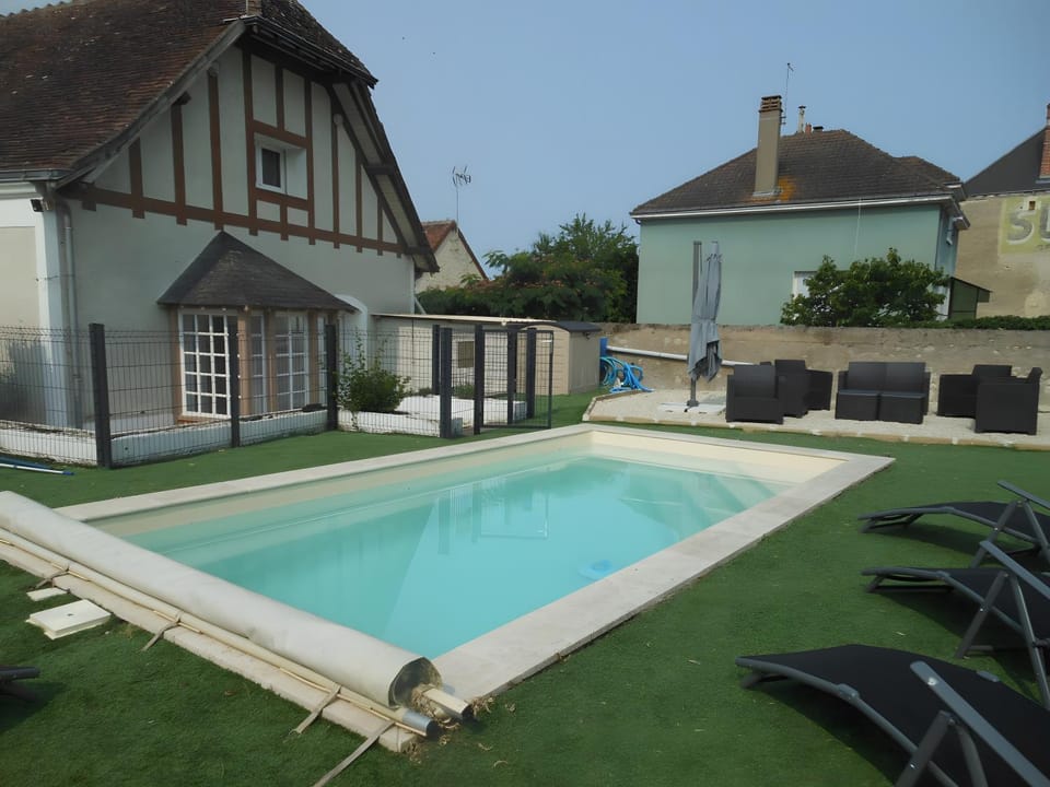 Property building, Living room, Swimming pool