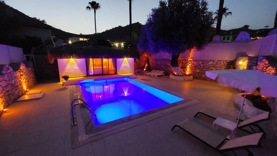 Patio, Night, Natural landscape, Pool view, Swimming pool, sunbed