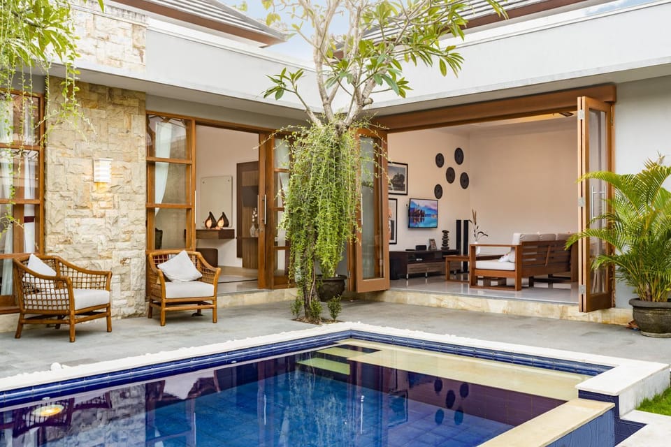 Property building, Communal lounge/ TV room, Day, Living room, Seating area, Pool view, Swimming pool
