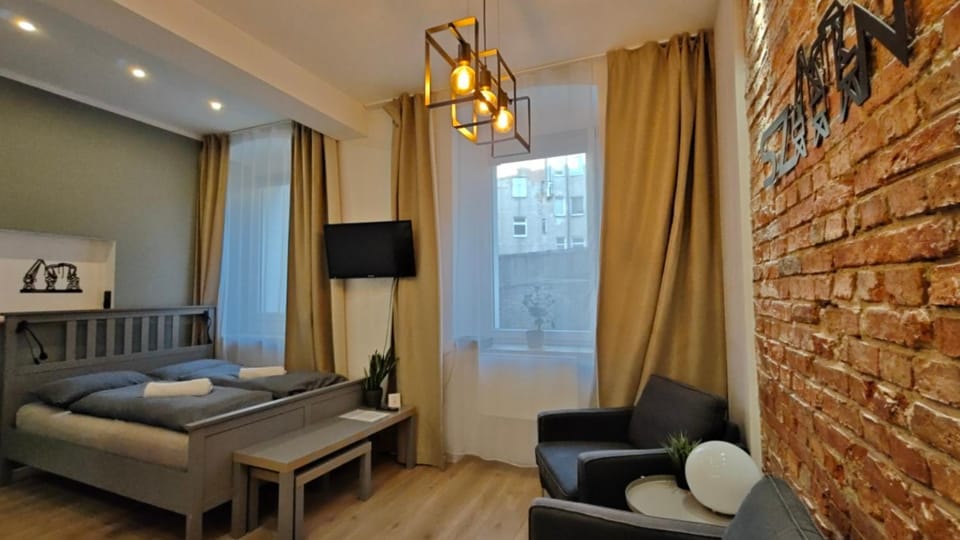 Bed, Living room, Seating area, Bedroom