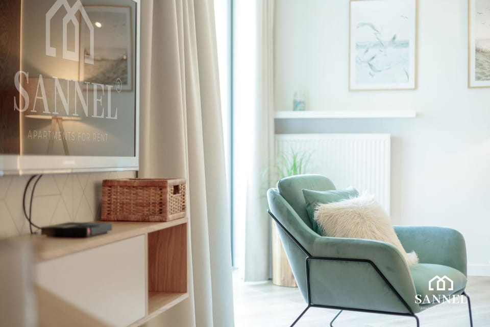 Property logo or sign, TV and multimedia, Living room, Decorative detail, Decorative detail, Seating area, On site, hair dresser
