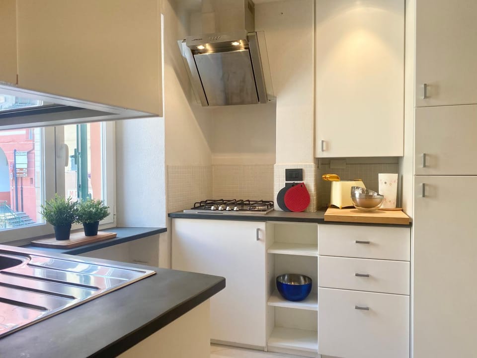 Kitchen or kitchenette, stove