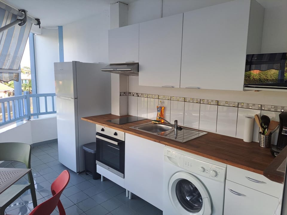 Appartement cosy en résidence à deux pas de la mer Apartment in Le Diamant