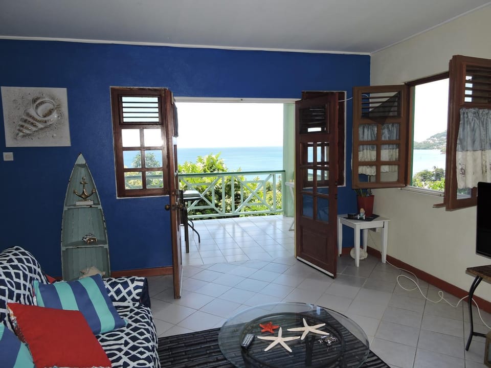 Neighbourhood, Natural landscape, Living room, Seating area, Beach, Garden view, Sea view, Area and facilities, Time of day