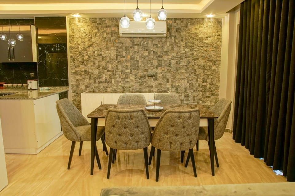 Kitchen or kitchenette, Living room, Seating area, Dining area, air conditioner