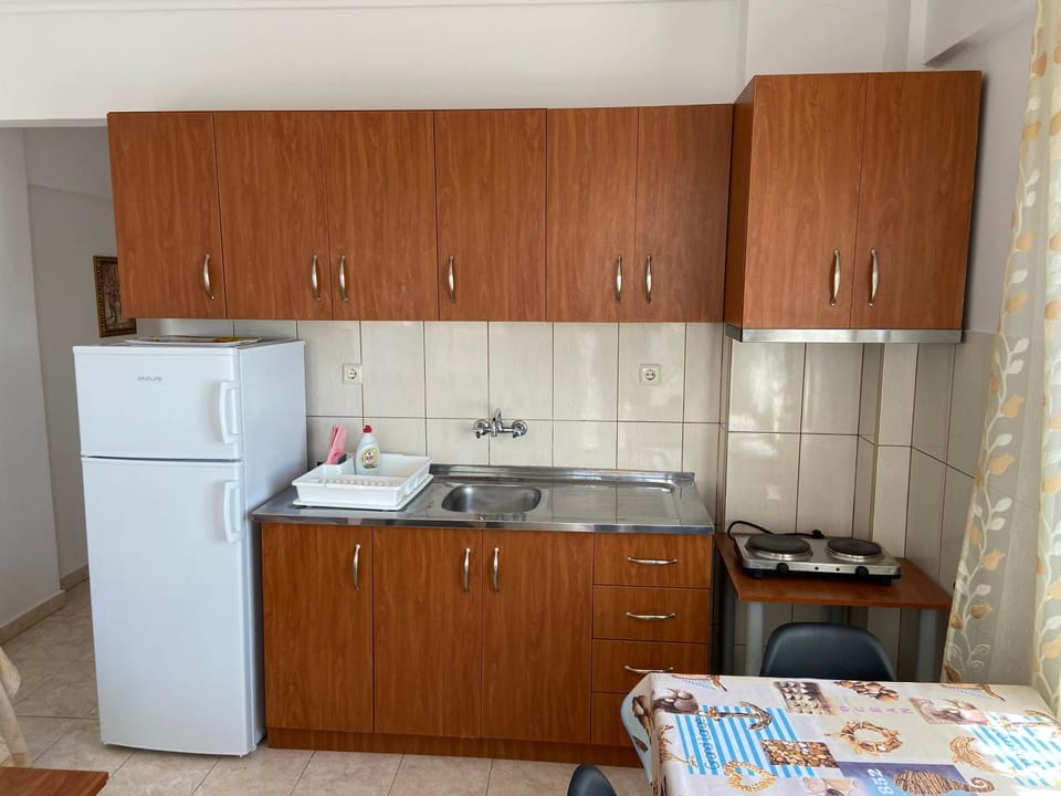 Kitchen or kitchenette, stove