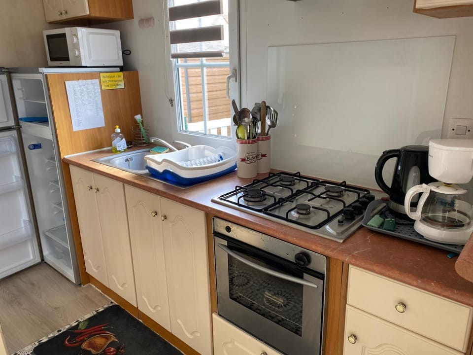 Kitchen or kitchenette, stove
