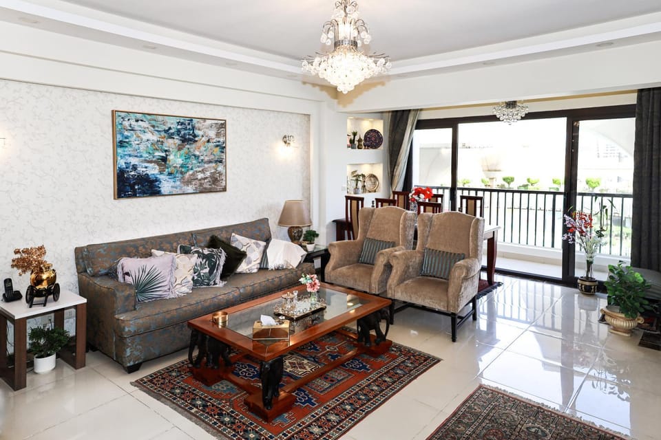 Luxury hotel apartment with pools in front AUC Apartment in New Cairo City