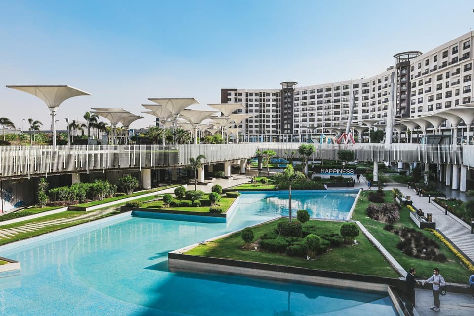 Luxury hotel apartment with pools in front AUC Apartment in New Cairo City