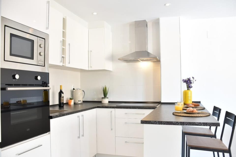 Kitchen or kitchenette, stove, toaster